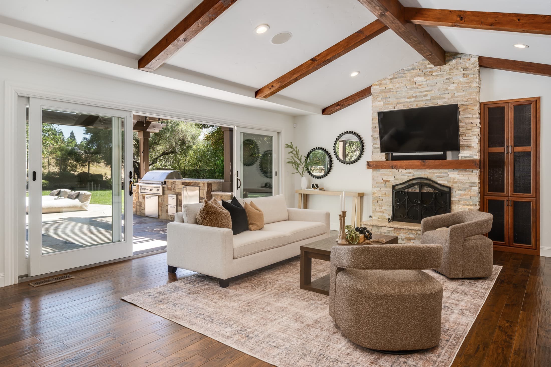 Architectural material detail — stone, beams, and millwork.